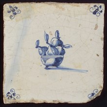 White tile with blue fruit bowl; corner motif spider, wall tile tile sculpture ceramic earthenware glaze, baked 2x glazed