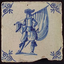 Tile, blue on white ground, standard bearer, corner motif of ox's head, wall tile tile sculpture ceramic earthenware glaze