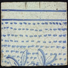 Tile of chimney pilaster, blue on white, tops of two branches with leaves, running downwards on the tile, horizontal blue lines