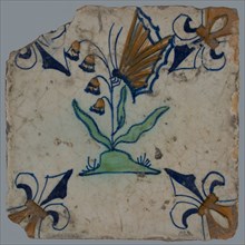 Tile, flower on ground with butterfly in orange, brown, green and blue on white, corner pattern french lily, corner point yellow