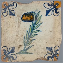 Tile, flower on ground in orange, green and blue on white, corner pattern french lily, corner point orange, wall tile
