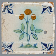 Tile, flower on ground in orange, green and blue on white, corner pattern french lily, corner point orange, drilled hole