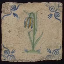 Tile, flower on ground in orange, green and blue on white, corner motif oxen head, wall tile tile sculpture ceramic earthenware