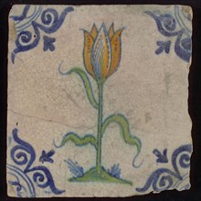Tile, flower on plot of green, yellow and blue on white, corner pattern of ox's head, wall tile tile sculpture ceramic
