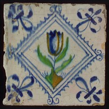 Tile, tulip on ground in orange, green and blue on white, inside serrated square with plume, corner pattern french lily, wall