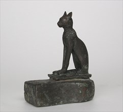 Statuette of a Cat, Late Period (after 600 BC), Egyptian, Egypt, Bronze, 7.7 × 3.7 × 6 cm (3 × 1