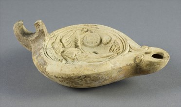 Lamp, 1st/2nd century AD, Roman, Italy, terracotta, 15 × 9.25 × 5 cm (5 7/8 × 3 5/8 × 2 in.)