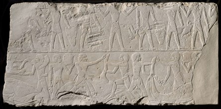 Fragment of a Tomb Wall Depicting Offering Bearers and Butchers, Old Kingdom, mid–Dynasty 5–early