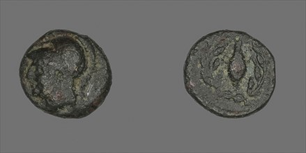 Coin Depicting the Goddess Athena, after 340 BC, Greek, Ancient Greece, Bronze, Diam. 1.1 cm, 1.38