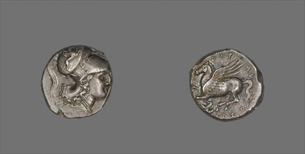Stater (Coin) Depicting the Goddess Athena, 317/310 BC, Greek, Syracuse, Silver, Diam. 2 cm, 8.66 g