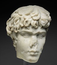 Fragment of a Portrait Head of Antinous, Mid–2nd century AD, Roman, Italy, Marble, 31.7 × 31 × 17