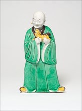Seated Luohan Holding a Lion, Qing dynasty (1644–1911), c. 19th century, China, Porcelain painted