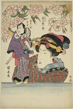 Woman holding puppet of actor Ichikawa Danjuro VII as Karigane Bunshichi, c. 1820s, Utagawa