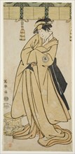 The actor Segawa Tomisaburo II as Prince Korehito in the guise of the maid Wakakusa of the Otomo