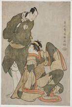 The actors Iwai Hanshiro IV (R) as Ohan of the Shinanoya and Bando Hikosaburo III (L) as Obiya
