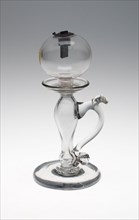 Lamp, c. 1820, England, Glass, clear, baluster stem, spherical font, with S-scroll handle and metal