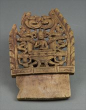 Crown Panel Depicting a Tathaghata, 12th century, Western Tibet, Western Tibet, Wood, 17 x 10.3 x 1