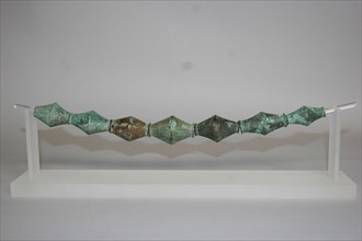 Biconical Bead Necklace, Geometric Period (800–600 BC), Greek, Thessaly, Greece, Bronze, 3.6 × 5.1