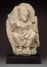Goddess Hariti Seated Holding a Child, 2nd/3rd century, Pakistan, Ancient region of Gandhara,