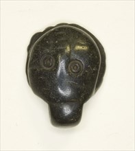 Face Amulet, Coptic Period (4th–7th century AD), Egyptian, Egypt, Stone, 2.2 × 1.9 × 0.6 cm (7/8 ×