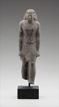 Egyptian, Statue of the Priest, Pa-ef-tchau-em-awy-Bastet, 595/589 BC, basalt, 9 1/4 x 2 3/4 x 2