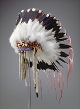 Crow, Native American, Feather Headdress, ca. 1890, leather, eagle feathers, ermine skins, glass