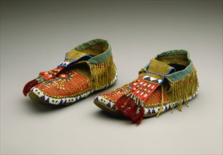 Sioux, Native American, Pair of Moccasins, ca. 1900, cowhide, rawhide, porcupine quills, glass