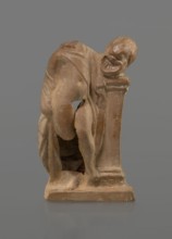 Terracotta figurine of a youth with a terracotta mask; creator, ca. 332–30 BC, Hellenistic period