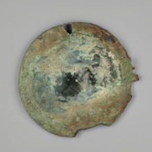 Mirror cover, The cover, with an edge bent inwards at a right angle, is decorated with concentric