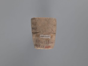Seal, unknown South Egyptian workshop, pyramidal clay seal with a roughly square stamp surface and