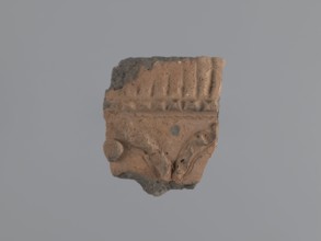 Fragment of a utility vessel Utility Ware. Made of type C Nile clay, highly porous with organic