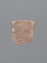 Fragment of a conical bowl or possibly a large funnel, tabletop or kitchen vessel. Made in an