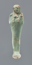 Shabti, Mummy-shaped figurine, funerary gift, 664–332 BC Late Period, Egypt. Standing on a base,