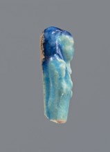 Shabti, Mummy-shaped figurine, funerary gift; back supported by a pillar/pilaster. Legs missing.