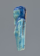Shabti, mummy-shaped figurine, funerary offering. Mummy-shaped figurine supported at the back on a