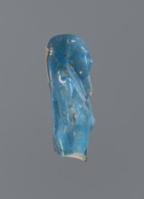 Shabti, Mummy-shaped figurine, funerary offering. Supported on a pillar at the back. Legs missing.