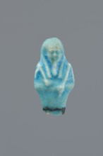 Shabti, Mummy-shaped figurine, funerary gift, supported on a pillar at the back. Legs missing. Arms
