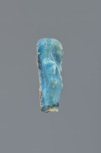 Shabti, Mummy-shaped figurine, funerary gift; supported on a pillar at the back. Legs missing. Arms