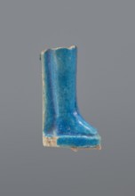 Shabti legs, mummy-shaped figurine, funerary gift. Fragment of the legs preserved from the knees