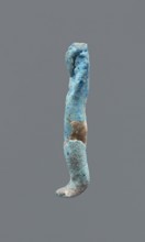 Shabti, Mummy-shaped figurine, funerary gift. Legs missing. Arms crossed on the chest; hands
