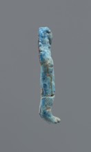 Shabti, Mummy-shaped figurine, funerary gift. Legs missing. Arms crossed on the chest; hands