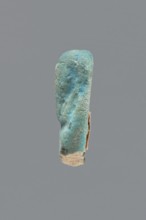 Shabti, Mummy-shaped figurine, funerary gift. Legs missing. Arms crossed on the chest, hands