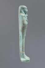 Ushabti, Mummy-shaped figurine, funerary offering, standing on a base with a narrow, slightly