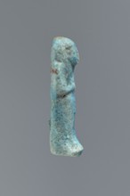 Ushabti, Mummy-shaped figurine, funerary offering, impressed in a mold, carelessly made of faience.