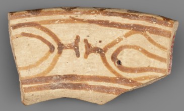 Fragment of a bowl, unknown northern Mesopotamian workshop; bucranium ornament; painted pottery