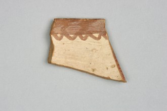 Fragment of a bowl, unknown Northern Mesopotamian workshop; painted pottery with geometric motifs,