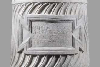 Urn of Gnaeus Pedanius Callistus with Latin inscription, unknown Roman workshop. A cylindrical urn