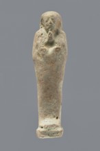Ushabti, mummy-shaped figurine, funerary gift, hoes. Mummy-shaped figurine standing on a base, back