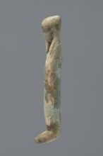 Ushabti, Mummy-shaped figurine, very schematically shaped. Hands crossed on the chest. On the head