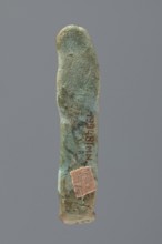 Ushabti, Mummy-shaped figurine, very schematically shaped. Hands crossed on the chest. On the head